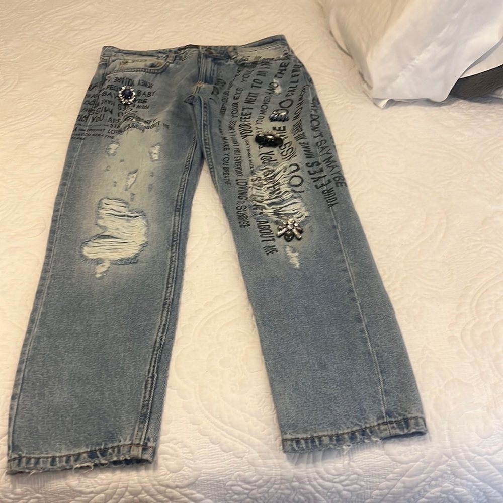 Mid rise boyfriend jeans.